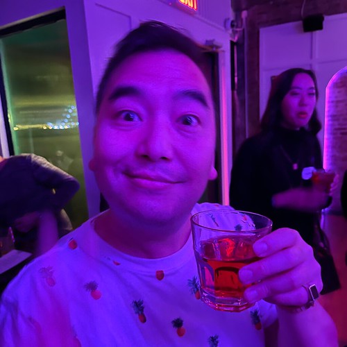 Artist Jerry Ma with cocktail