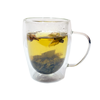 Clear mug of Dragon Fruit and Rose Green Loose Leaf Tea