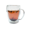 Clear mug of mixed fruit tea