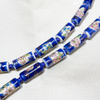 Close up of tube-shaped cloisonne design necklace - dark blue