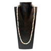 Close up of tube-shaped cloisonne design necklace - white