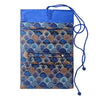 Open blue brocade jewelry roll