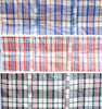 Close-up of plaid patterns in blue, red, and black